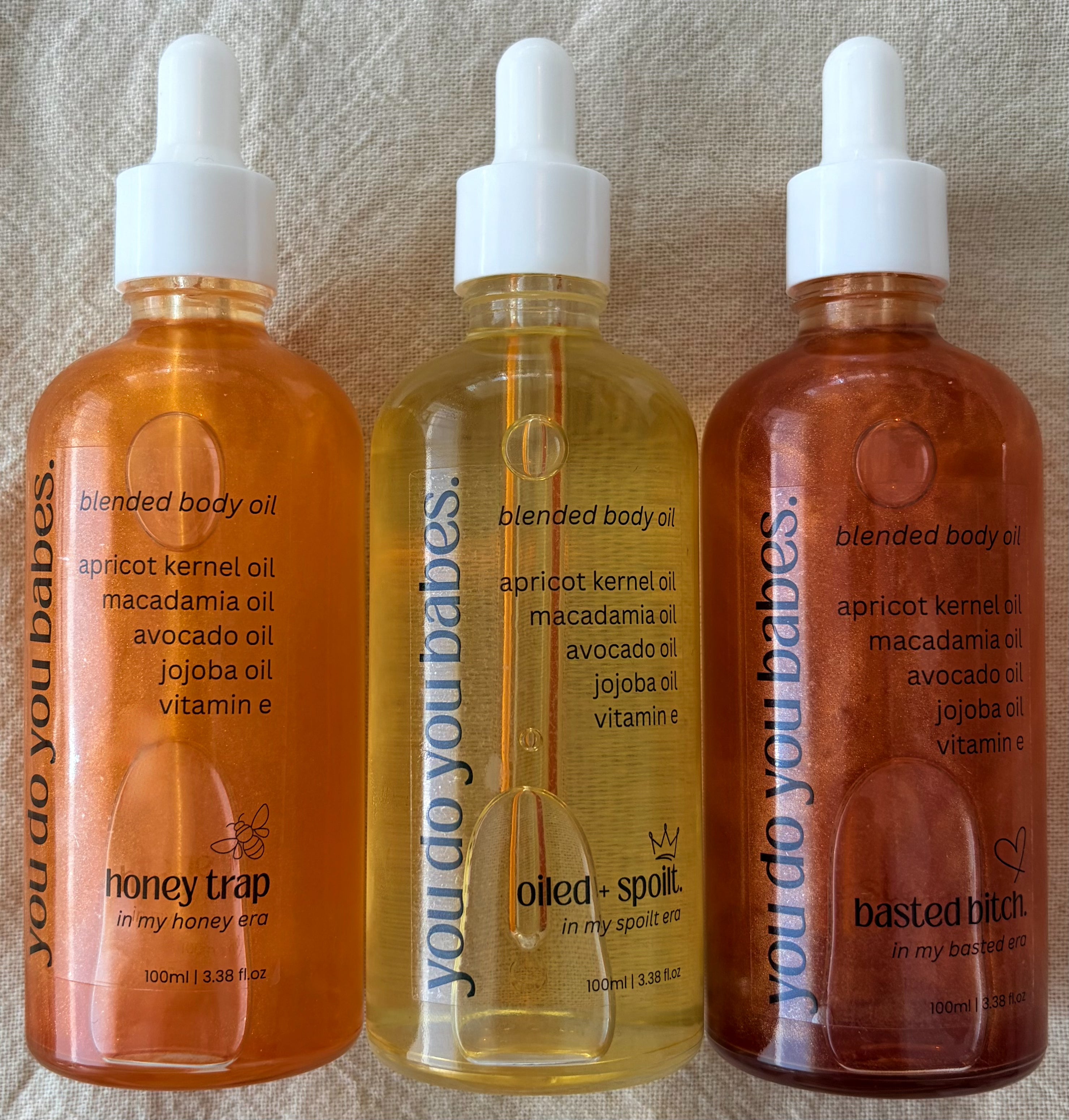 Three bottles of blended body oils from you do you babes