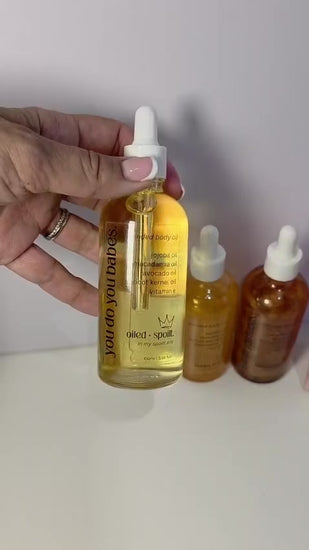 Oiled and Spoilt Body Oil being held